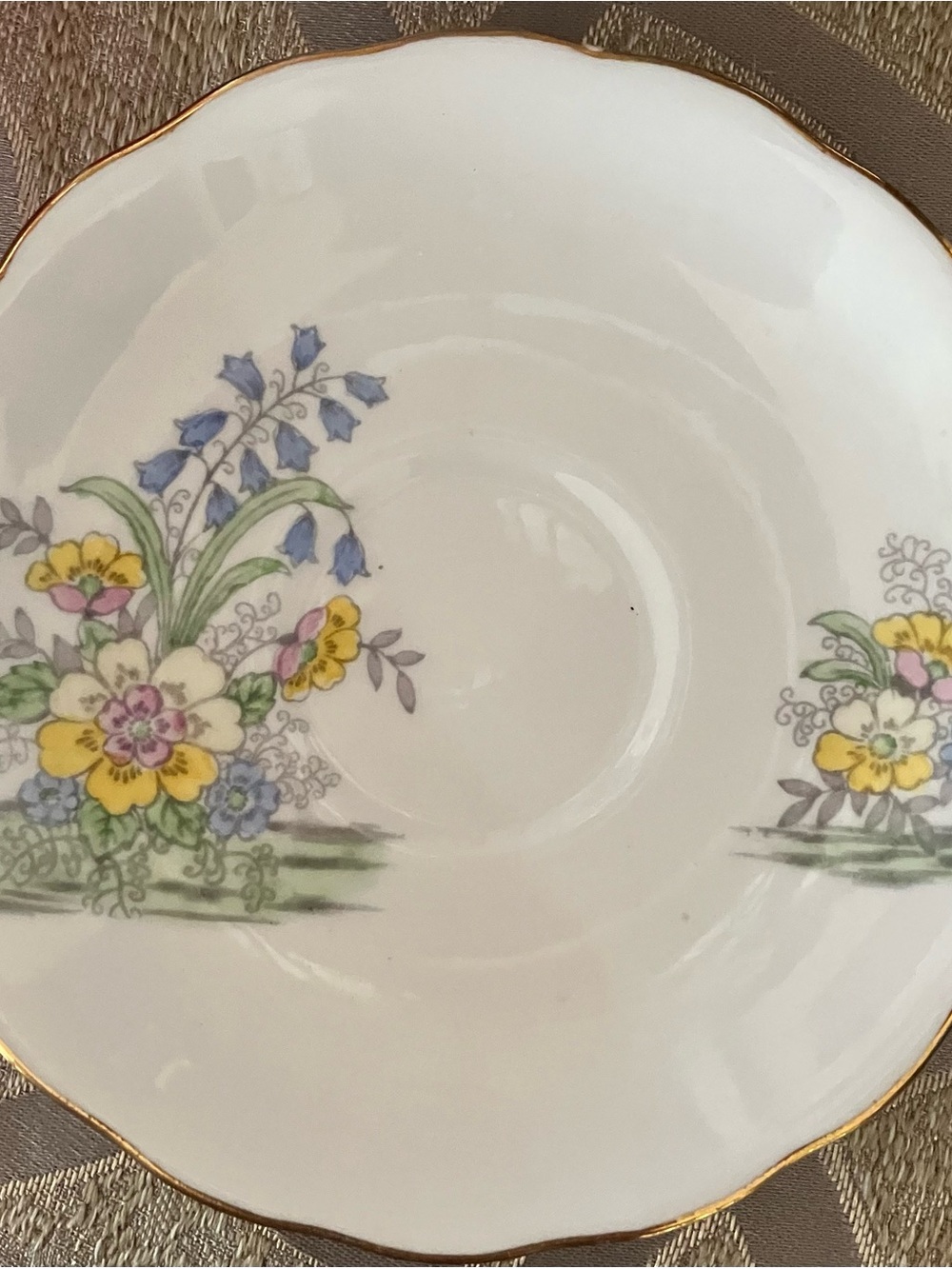 Classic White Saucer with Yellow and Blue Floral Motif